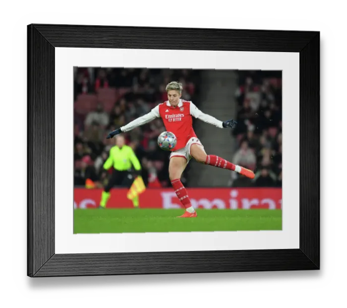 Framed Print : Arsenal FC: Kim Little's Unwavering Focus and Determination Before the UEFA Women's Champions League Match against Olympique Lyonnais