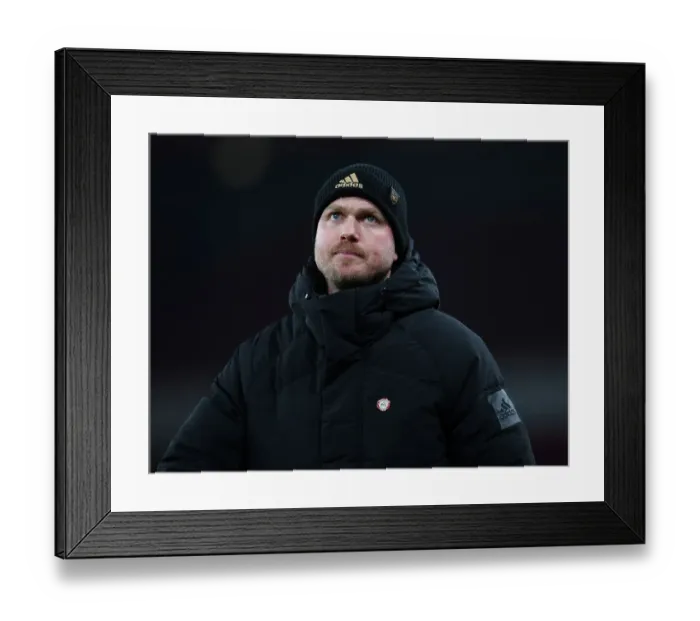 Framed Print : Arsenal's Kim Little: Unwavering Focus Amidst Champions League Showdown against Olympique Lyonnais