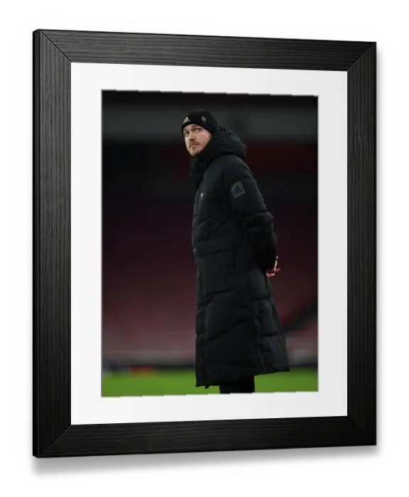 Framed Print : Arsenal's Kim Little: Focus and Determination Before Champions League Clash with Olympique Lyonnais (December 2022)