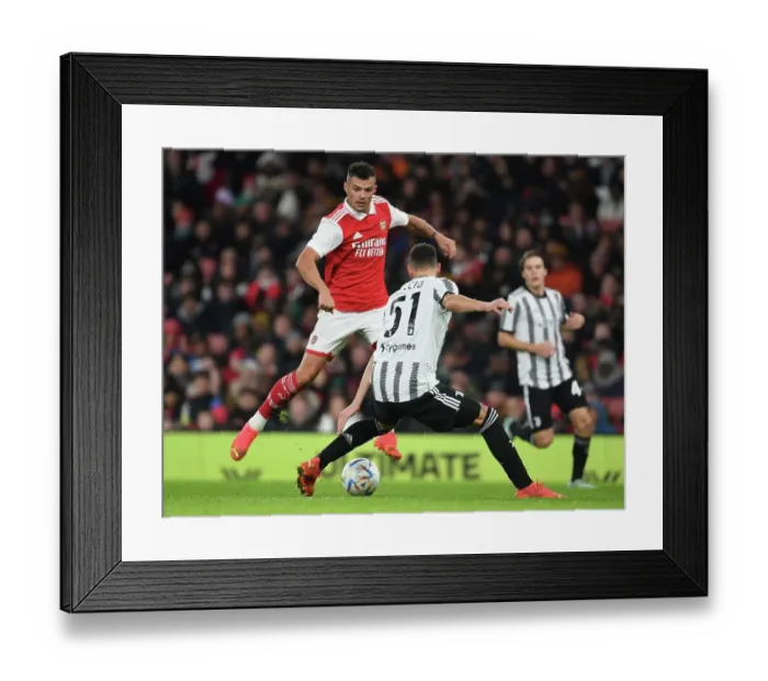 Framed Print : Arsenal vs Juventus: Granit Xhaka's Showdown at Emirates Stadium (2022-23) Framed Print : Arsenal vs Juventus: Granit Xhaka's Showdown at Emirates Stadium (2022-23)