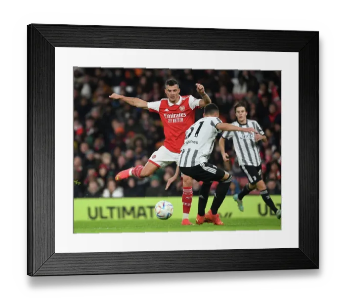 Framed Print : Arsenal vs Juventus: Granit Xhaka's Showdown at Emirates Stadium (2022-23) Framed Print : Arsenal vs Juventus: Granit Xhaka's Showdown at Emirates Stadium (2022-23)