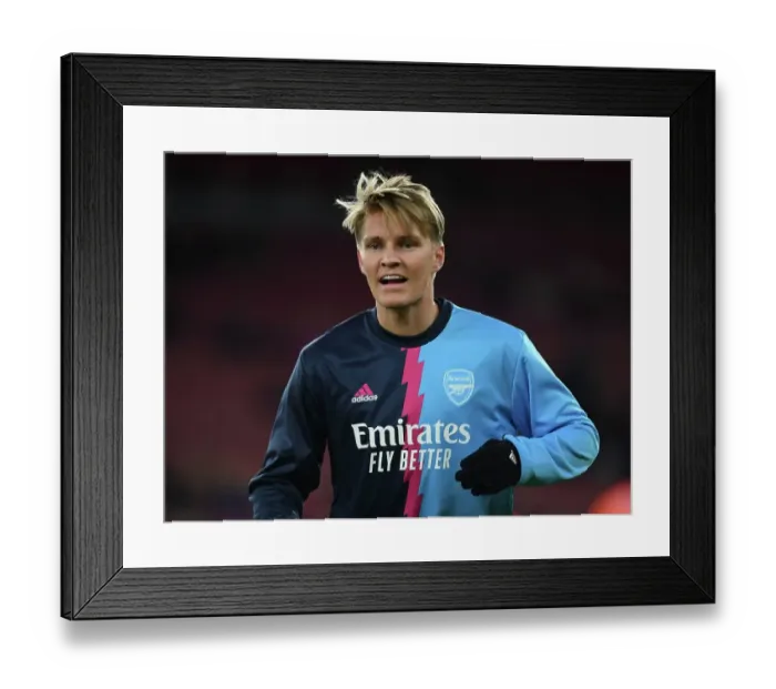 Framed Print : Martin Odegaard's Intense Pre-Match Focus: Arsenal vs Juventus (2022-23)