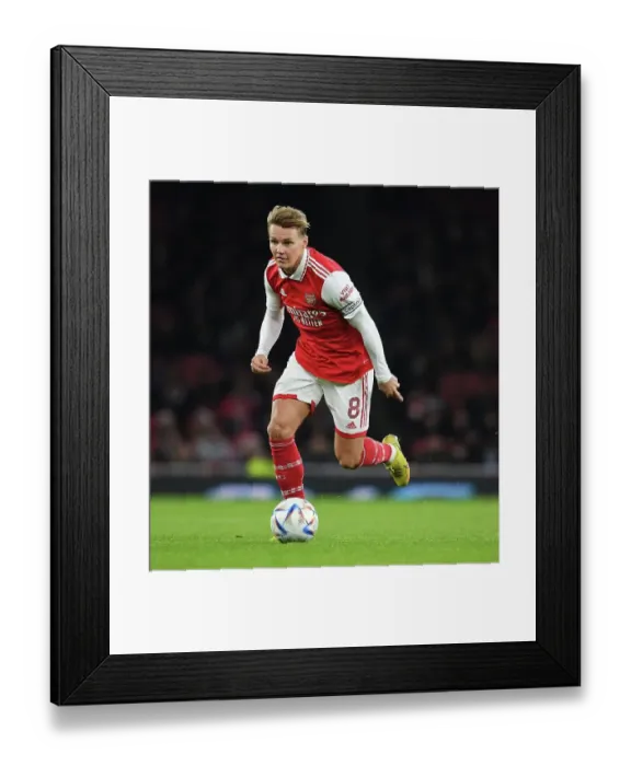 Framed Print : Arsenal's Martin Odegaard Shines in Clash Against Juventus at Emirates Stadium (2022-23)