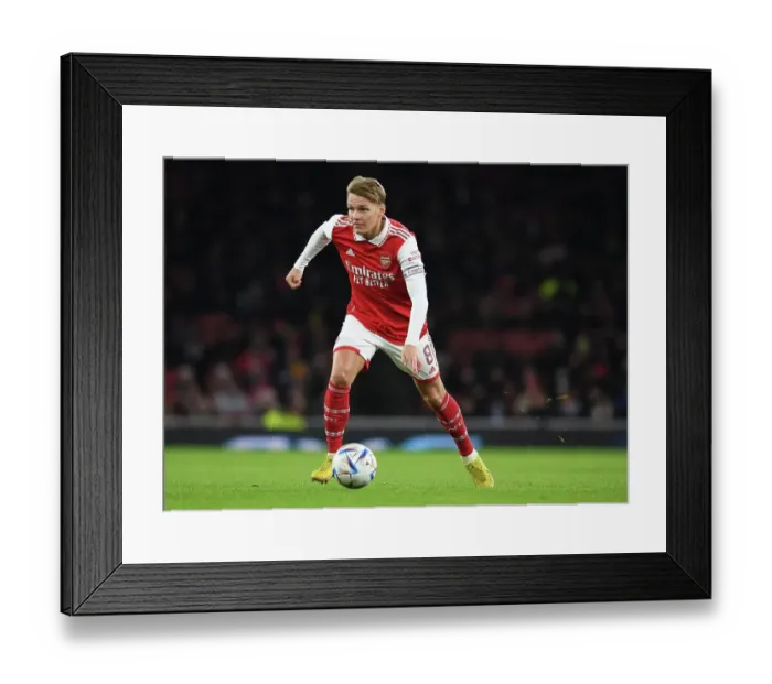 Framed Print : Arsenal vs Juventus Clash: Martin Odegaard Shines at Emirates Stadium (2022-23) Framed Print : Arsenal vs Juventus Clash: Martin Odegaard Shines at Emirates Stadium (2022-23)