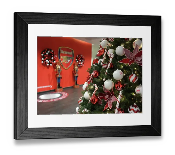 Framed Print : Arsenal vs Juventus: Festive Rivalry at Emirates Stadium