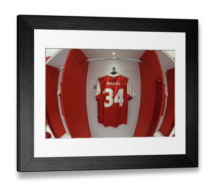 Framed Print : Arsenal FC: Granit Xhaka's Shirt in Arsenal Changing Room Before Arsenal vs Juventus (2022-23)