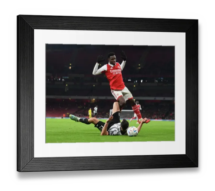 Framed Print : Arsenal's Eddie Nketiah Goes Head-to-Head with Juventus at Emirates Stadium (2022-23) Framed Print : Arsenal's Eddie Nketiah Goes Head-to-Head with Juventus at Emirates Stadium (2022-23)