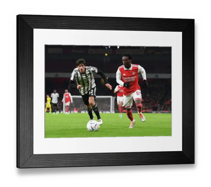 Framed Print : Young Gun Cozier-Duberry Outshines Barbieri: Arsenal's Rising Star Outsmarts Juventus Defender in Thrilling Friendly Clash