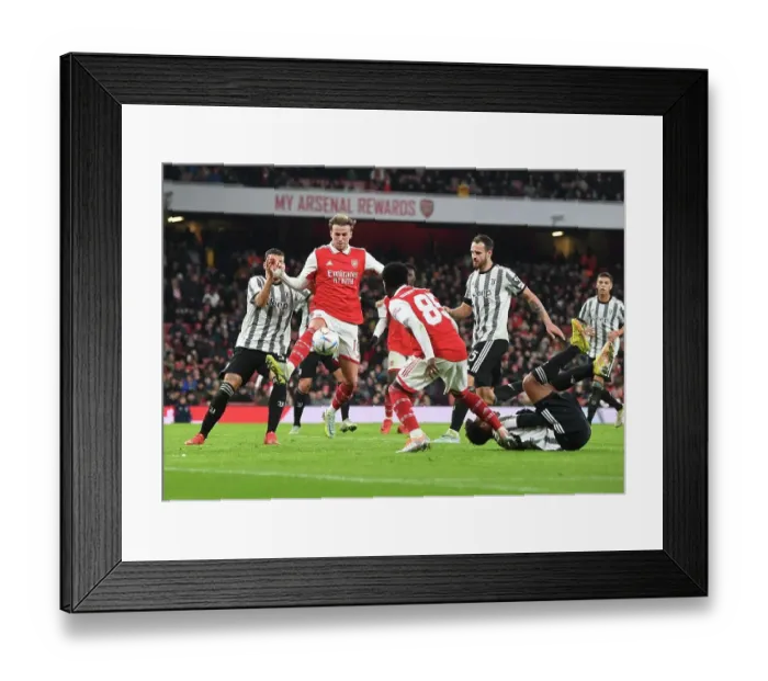 Framed Print : Clash of Titans: Arsenal vs Juventus - Battle at Emirates Stadium Framed Print : Clash of Titans: Arsenal vs Juventus - Battle at Emirates Stadium
