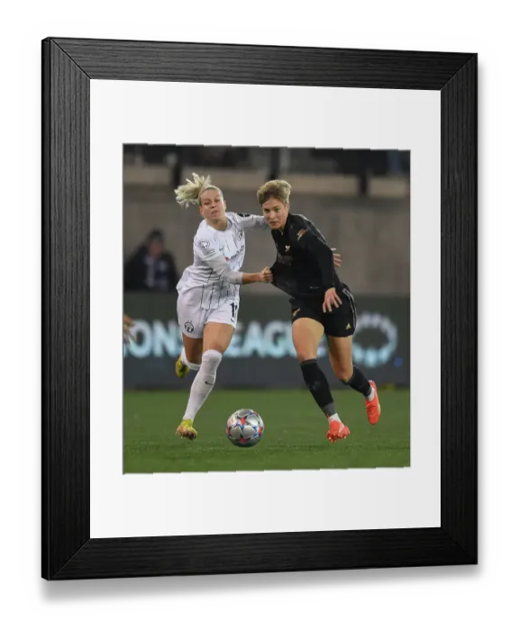 Framed Print : Arsenal Women vs. FC Zurich: A Battle in the UEFA Champions League