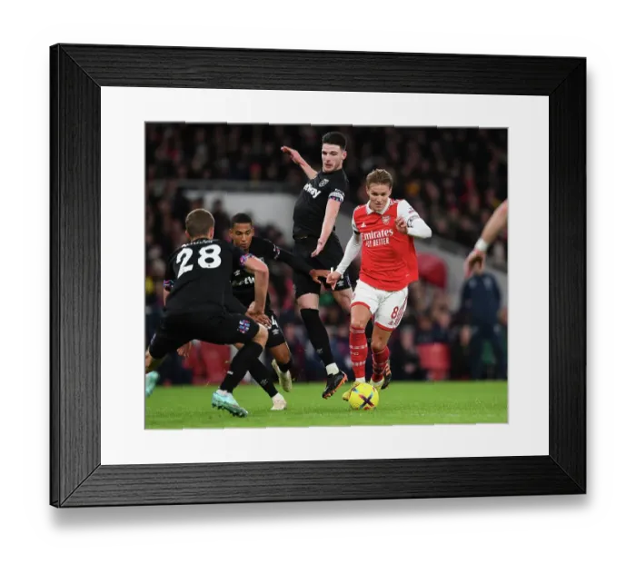Framed Print : Arsenal vs. West Ham: Odegaard Clashes with Rice in Premier League Showdown (December 2022)