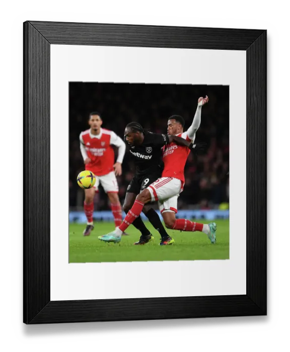 Framed Print : Arsenal vs. West Ham: Gabriel Magalhaes Faces Off Against Michail Antonio in Premier League Clash Framed Print : Arsenal vs. West Ham: Gabriel Magalhaes Faces Off Against Michail Antonio in Premier League Clash