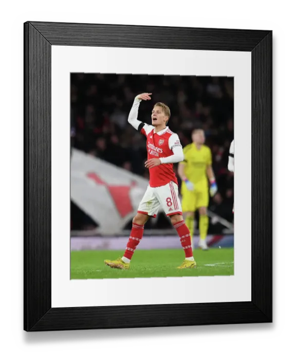 Framed Print : Martin Odegaard Shines: Arsenal's Christmas Victory over West Ham United