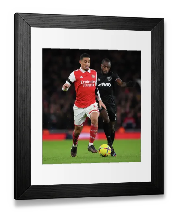 Framed Print : Saliba vs. Antonio: A Premier League Showdown at the Emirates