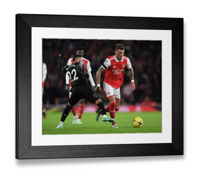 Framed Print : Arsenal vs. West Ham: Battle for Premier League Supremacy - Ben White vs. Said Benrahma Clash