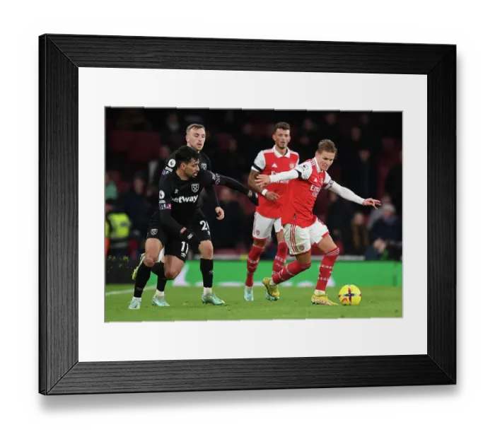Framed Print : Arsenal vs. West Ham: Martin Odegaard Clashes with Lucas Paqueta in Premier League Showdown (December 2022)