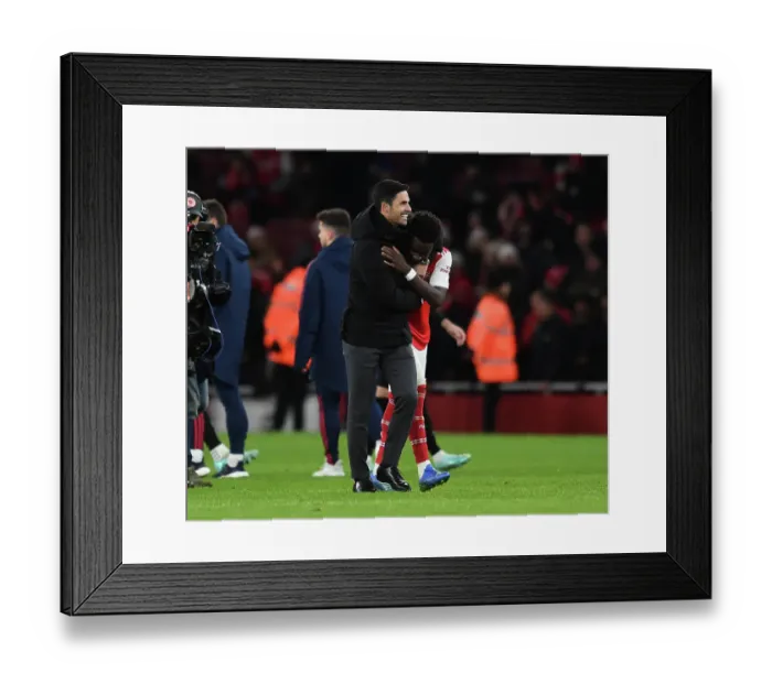 Framed Print : Arsenal's Mikel Arteta and Bukayo Saka Celebrate Victory over West Ham United Framed Print : Arsenal's Mikel Arteta and Bukayo Saka Celebrate Victory over West Ham United