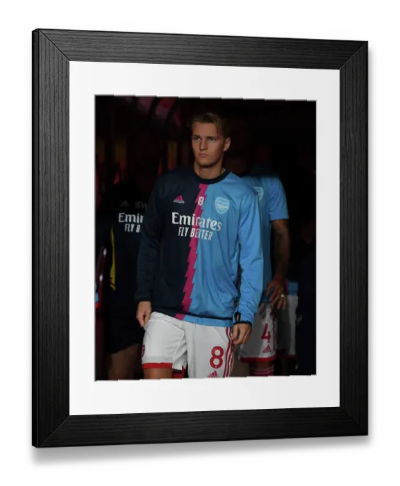 Framed Print : Arsenal's Martin Odegaard Gears Up Before Arsenal v West Ham United (2022-23)