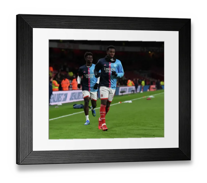 Framed Print : Arsenal's Eddie Nketiah Prepares for Arsenal vs. West Ham United Showdown (2022-23)