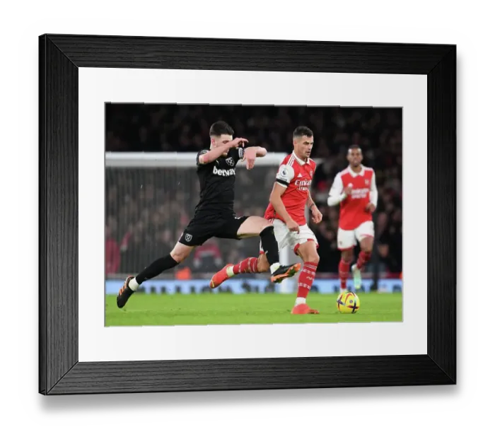 Framed Print : Battle of Midfield Titans: Xhaka vs. Rice in Arsenal vs. West Ham Premier League Showdown Framed Print : Battle of Midfield Titans: Xhaka vs. Rice in Arsenal vs. West Ham Premier League Showdown