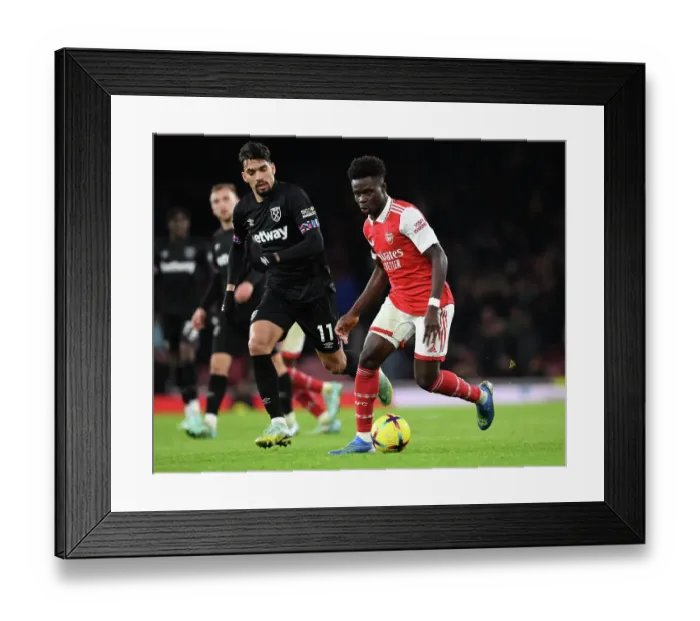 Framed Print : Bukayo Saka's Star Performance: Arsenal's Impressive Victory Over West Ham United Framed Print : Bukayo Saka's Star Performance: Arsenal's Impressive Victory Over West Ham United