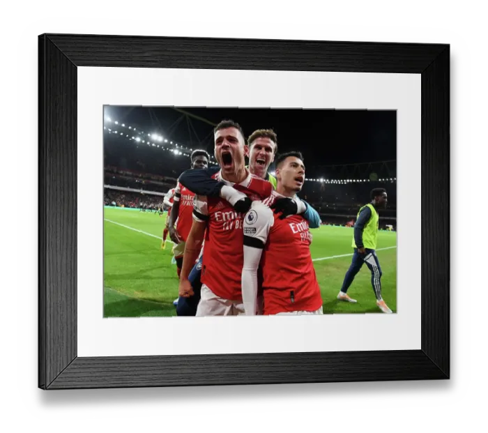 Framed Print : Martinelli and Xhaka-Led Arsenal Celebrate Second Goal Against West Ham in 2022-23 Premier League