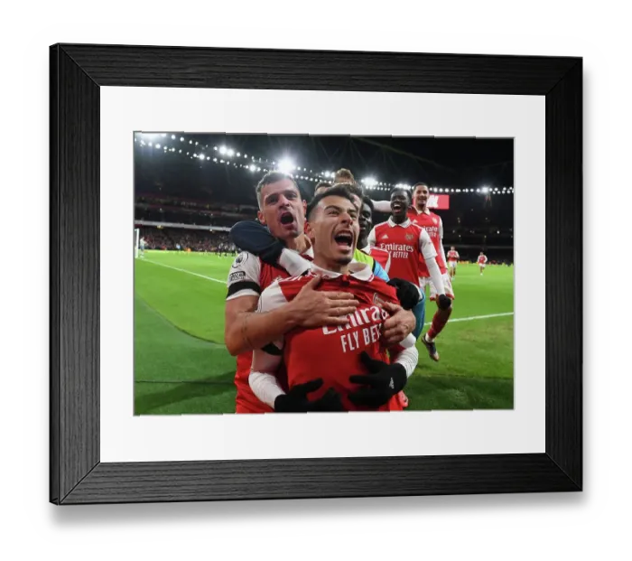 Framed Print : Martinelli and Xhaka Celebrate Arsenal's Victory over West Ham United (2022-23)