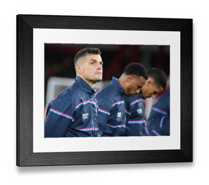 Framed Print : Arsenal's Granit Xhaka Gears Up for Arsenal v West Ham United (2022-23) Framed Print : Arsenal's Granit Xhaka Gears Up for Arsenal v West Ham United (2022-23)