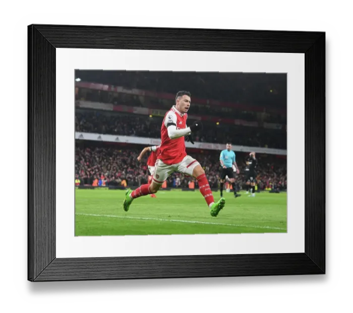 Framed Print : Martinelli's Brace: Arsenal Overpowers West Ham in Premier League Clash