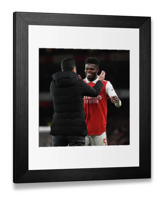 Framed Print : Arsenal Manager Mikel Arteta Embraces Thomas Partey After Substitution: Arsenal FC vs West Ham United, Premier League 2022-23