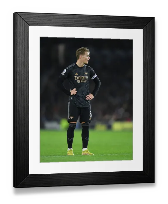 Framed Print : Martin Odegaard: Arsenal's Midfield Genius Shines in Premier League Triumph over Brighton (2022-23)