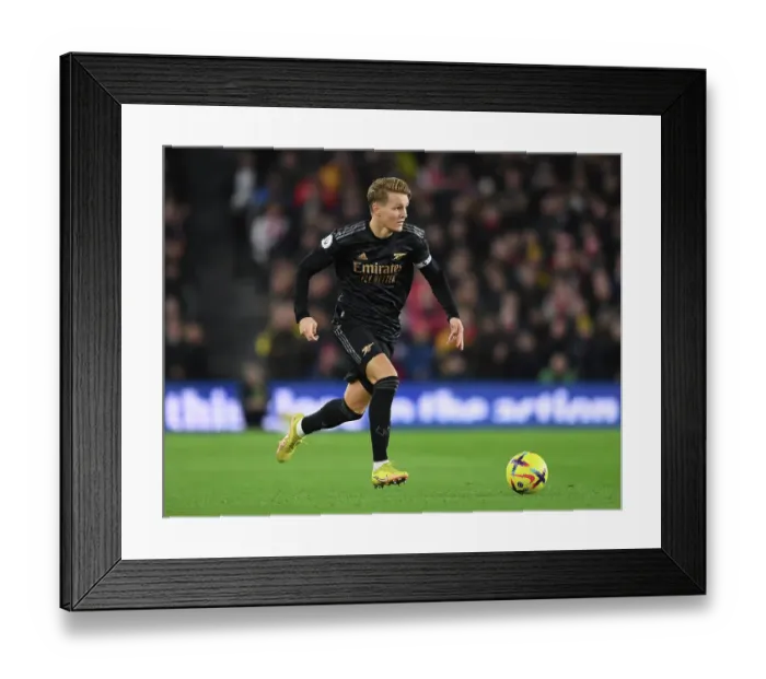 Framed Print : Martin Odegaard Shines: Arsenal's Midfield Genius Guides Team to Premier League Triumph over Brighton (2022-23)