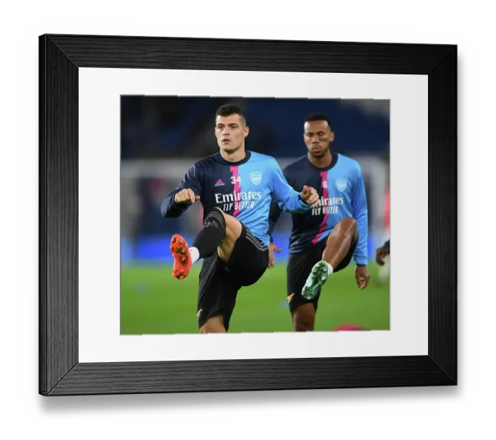 Framed Print : Granit Xhaka's Intense Pre-Match Focus: Arsenal FC vs. Brighton & Hove Albion, Premier League 2022-23