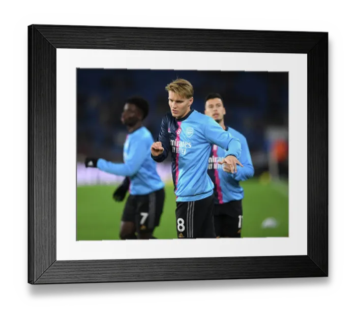 Framed Print : Arsenal's Martin Odegaard Prepares for Brighton Clash in Premier League (2022-23)