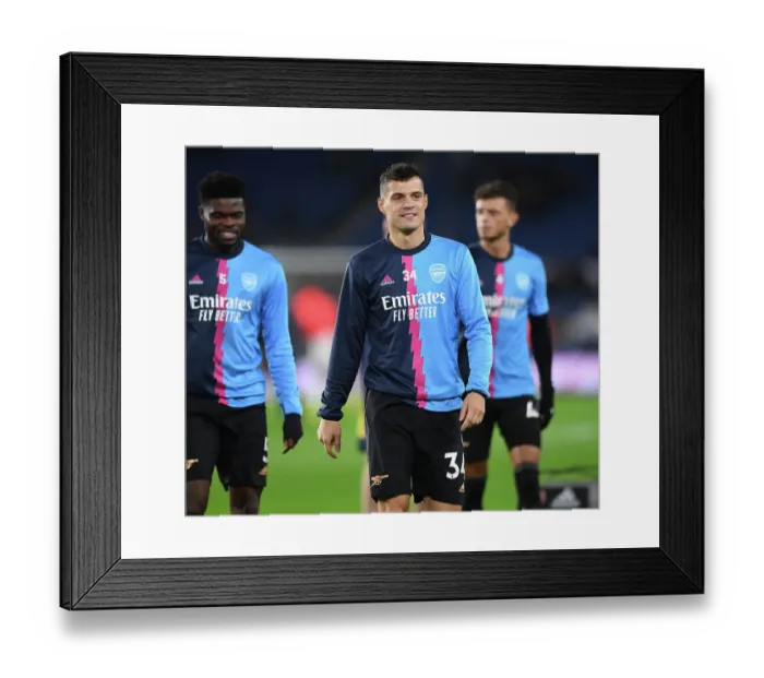 Framed Print : Granit Xhaka's Pre-Match Routine: Arsenal vs. Brighton & Hove Albion, Premier League 2022-23