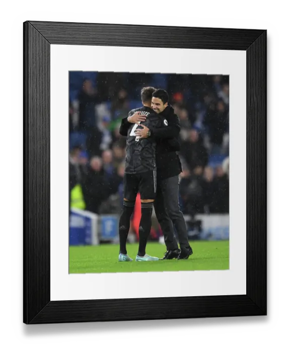 Framed Print : Arsenal Manager Mikel Arteta Celebrates with Ben White after Brighton Victory, Premier League 2022-23