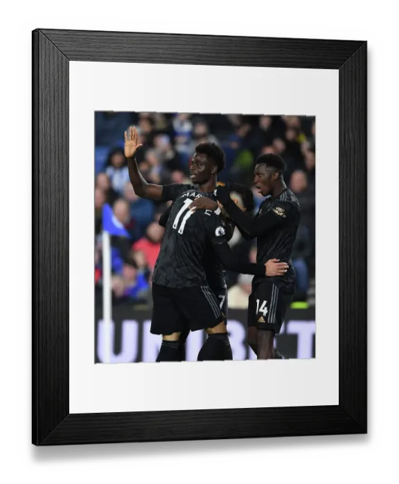 Framed Print : Martinelli, Saka, and Nketiah Celebrate Arsenal's Four Goals Against Brighton (Brighton vs Arsenal 2022-23) Framed Print : Martinelli, Saka, and Nketiah Celebrate Arsenal's Four Goals Against Brighton (Brighton vs Arsenal 2022-23)