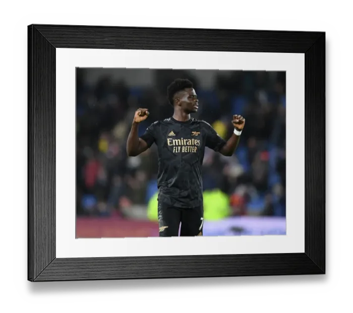 Framed Print : Bukayo Saka's Celebration: Arsenal Fans Rejoice in Brighton Victory Framed Print : Bukayo Saka's Celebration: Arsenal Fans Rejoice in Brighton Victory