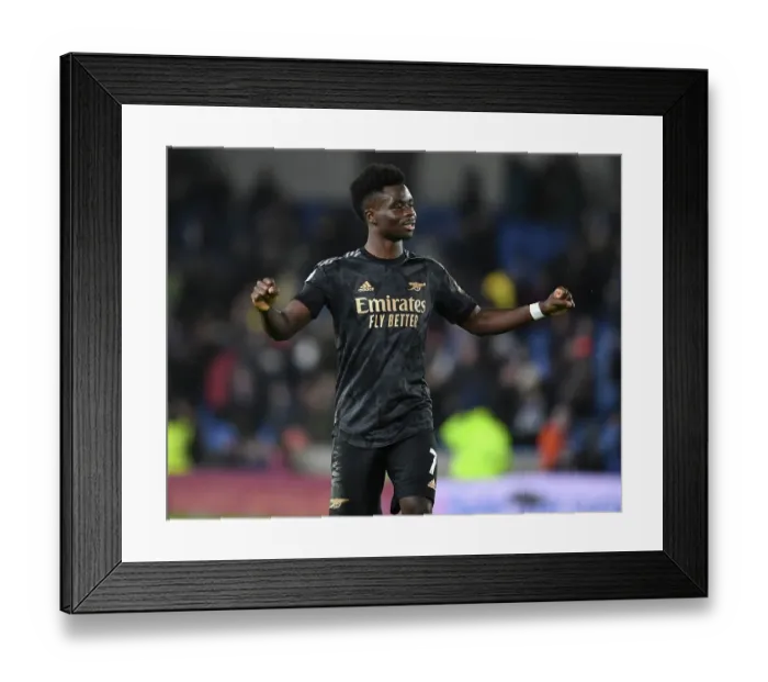 Framed Print : Arsenal's Bukayo Saka Celebrates Victory over Brighton with Fans (Premier League 2022-23)