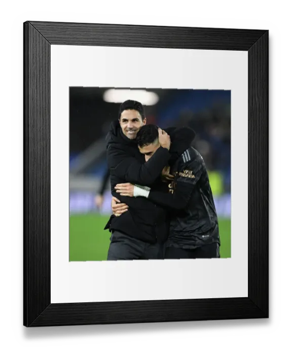 Framed Print : Arsenal's Victory at Brighton: Arteta and Martinelli Celebrate Premier League Win