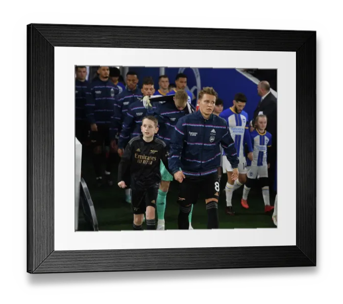 Framed Print : Martin Odegaard Gears Up: Arsenal's Readiness for Battle against Brighton & Hove Albion, Premier League 2022-23