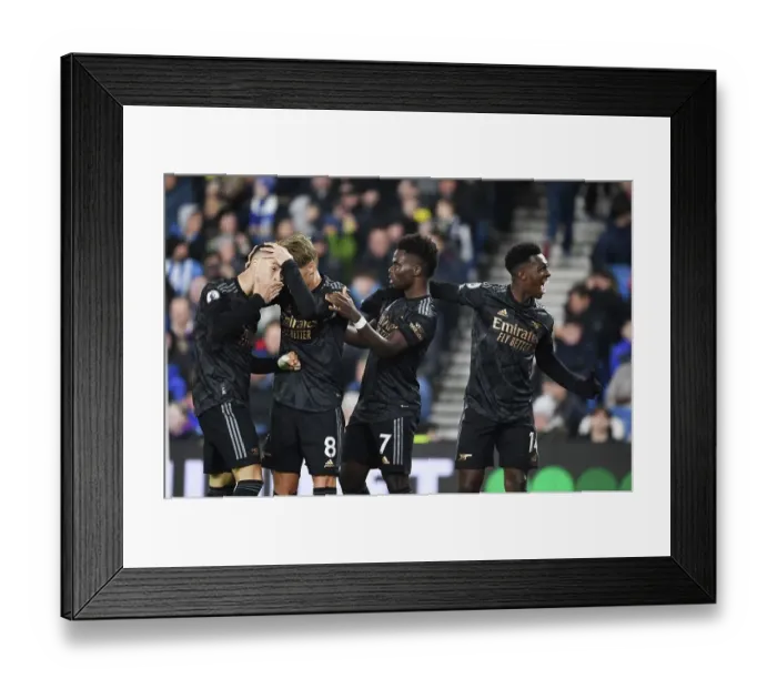 Framed Print : Arsenal's Martinelli, Odegaard, Saka, and Nketiah: Celebrating a Win Against Brighton Framed Print : Arsenal's Martinelli, Odegaard, Saka, and Nketiah: Celebrating a Win Against Brighton