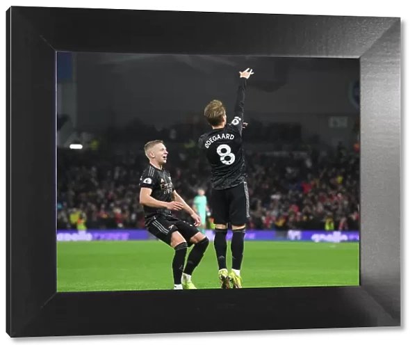 Arsenal's Unstoppable Duo: Odegaard and Zinchenko's Celebration of Second Goal Against Brighton (2022-23)
