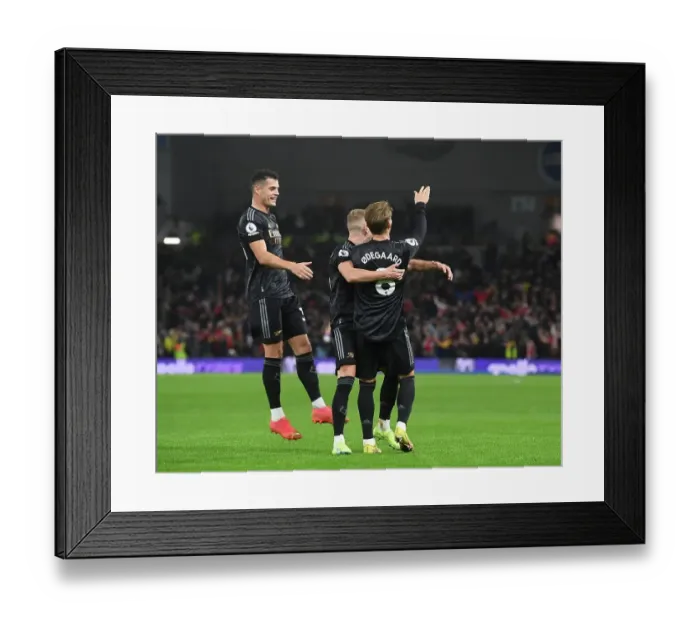 Framed Print : Martin Odegaard and Teammates Celebrate Arsenal's Goals Against Brighton & Hove Albion (December 2022)
