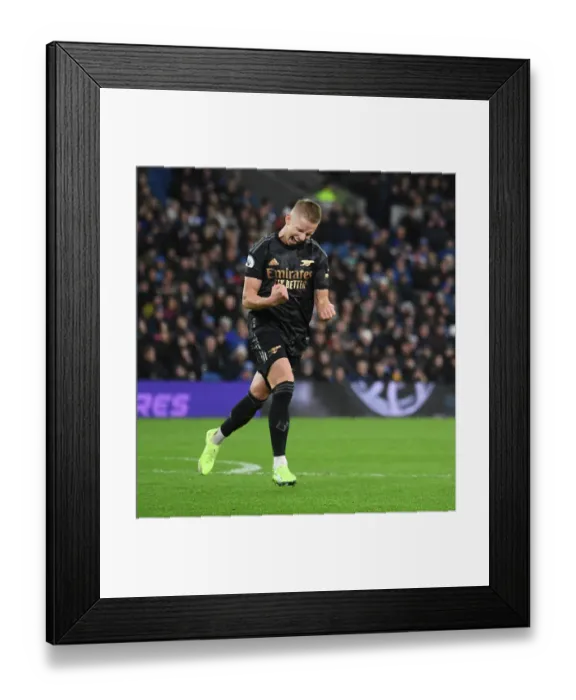 Framed Print : Arsenal Celebrate Odegaard's Goal Against Brighton in Premier League Clash