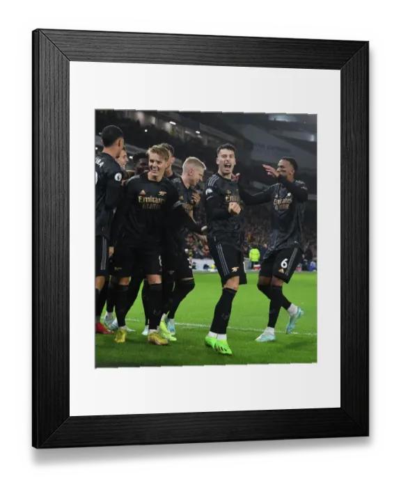 Framed Print : Arsenal's Triumph: Eddie Nketiah Hat-Trick Seals Victory Over Brighton in Premier League