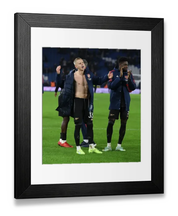 Framed Print : Arsenal's Zinchenko Celebrates Victory over Brighton with Fans