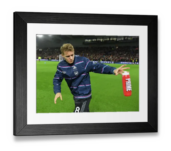 Framed Print : Martin Odegaard Gears Up: Arsenal vs. Brighton & Hove Albion, Premier League 2022-23 Framed Print : Martin Odegaard Gears Up: Arsenal vs. Brighton & Hove Albion, Premier League 2022-23