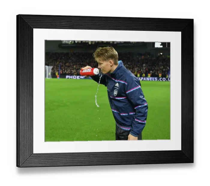 Framed Print : Martin Odegaard: Arsenal's Readiness Radiates Ahead of Brighton Clash, Premier League 2022-23