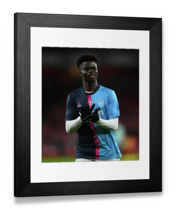 Framed Print : Arsenal's Bukayo Saka Gears Up: Arsenal FC vs Newcastle United, Premier League 2022-23